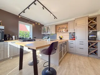 Wohnen auf zwei Ebenen in Haselünne: Großzügiger und stilvoller Bungalow mit neuwertiger Küche, Garage und Wintergarten! Bild 11