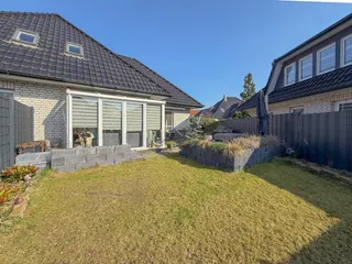 Wohnen auf zwei Ebenen in Haselünne: Großzügiger und stilvoller Bungalow mit neuwertiger Küche, Garage und Wintergarten! Bild 33