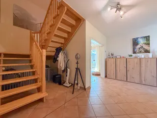 Wohnen auf zwei Ebenen in Haselünne: Großzügiger und stilvoller Bungalow mit neuwertiger Küche, Garage und Wintergarten! Bild 18
