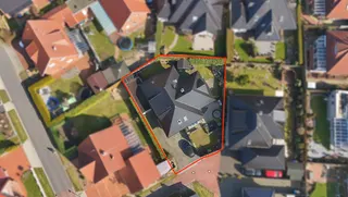 Wohnen auf zwei Ebenen in Haselünne: Großzügiger und stilvoller Bungalow mit neuwertiger Küche, Garage und Wintergarten! Bild 2
