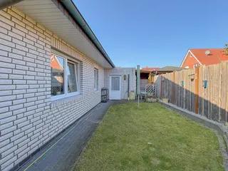 Wohnen auf zwei Ebenen in Haselünne: Großzügiger und stilvoller Bungalow mit neuwertiger Küche, Garage und Wintergarten! Bild 41