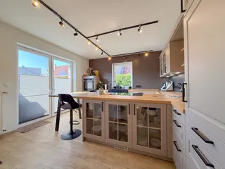 Wohnen auf zwei Ebenen in Haselünne: Großzügiger und stilvoller Bungalow mit neuwertiger Küche, Garage und Wintergarten! Bild 12