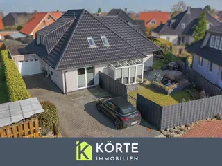 Wohnen auf zwei Ebenen in Haselünne: Großzügiger und stilvoller Bungalow mit neuwertiger Küche, Garage und Wintergarten! Bild 43
