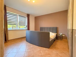 Wohnen auf zwei Ebenen in Haselünne: Großzügiger und stilvoller Bungalow mit neuwertiger Küche, Garage und Wintergarten! Bild 21