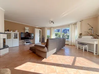 Wohnen auf zwei Ebenen in Haselünne: Großzügiger und stilvoller Bungalow mit neuwertiger Küche, Garage und Wintergarten! Bild 5