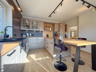 Wohnen auf zwei Ebenen in Haselünne: Großzügiger und stilvoller Bungalow mit neuwertiger Küche, Garage und Wintergarten! Bild 13