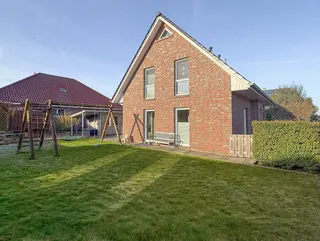 Einziehen & wohlfühlen: Junges und modernes Einfamilienhaus aus 2017 in familienfreundlichem Neubaugebiet in Lünne! Bild 4