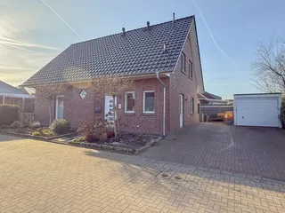 Einziehen & wohlfühlen: Junges und modernes Einfamilienhaus aus 2017 in familienfreundlichem Neubaugebiet in Lünne! Bild 6