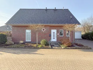 Einziehen & wohlfühlen: Junges und modernes Einfamilienhaus aus 2017 in familienfreundlichem Neubaugebiet in Lünne! Bild 7