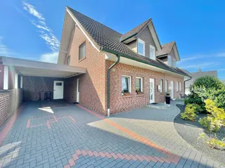 Doppelhaushälfte mit 3 Schlafzimmern, Einbauküche, Carport und sonnigem Grundstück sucht neue Eigentümer in Langen! Bild 2