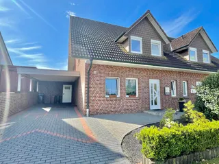Doppelhaushälfte mit 3 Schlafzimmern, Einbauküche, Carport und sonnigem Grundstück sucht neue Eigentümer in Langen! Bild 3