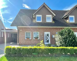 Doppelhaushälfte mit 3 Schlafzimmern, Einbauküche, Carport und sonnigem Grundstück sucht neue Eigentümer in Langen! Bild 4