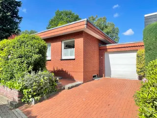Raus in die Natur: Modernisierter Flachdachbungalow mit Garage in ruhiger Wohnlage von Lingen - Schepsdorf! Bild 1