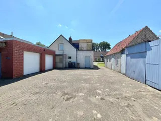 Gepflegtes Ein- bis Zweifamilienhaus mit diversen Garagen und Werkstätten zu verkaufen! Bild 8