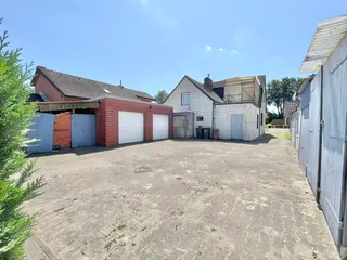 Gepflegtes Ein- bis Zweifamilienhaus mit diversen Garagen und Werkstätten zu verkaufen! Bild 10