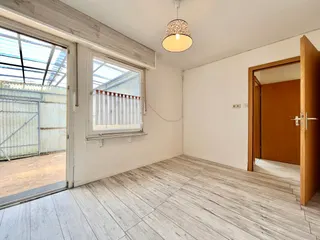 Gepflegtes Ein- bis Zweifamilienhaus mit diversen Garagen und Werkstätten zu verkaufen! Bild 28