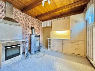 Gepflegtes Ein- bis Zweifamilienhaus mit diversen Garagen und Werkstätten zu verkaufen! Bild 24