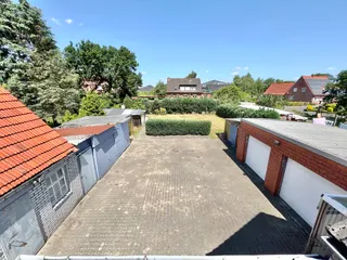 Gepflegtes Ein- bis Zweifamilienhaus mit diversen Garagen und Werkstätten zu verkaufen! Bild 13
