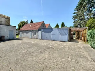 Gepflegtes Ein- bis Zweifamilienhaus mit diversen Garagen und Werkstätten zu verkaufen! Bild 11