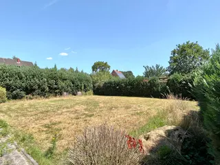 Gepflegtes Ein- bis Zweifamilienhaus mit diversen Garagen und Werkstätten zu verkaufen! Bild 15