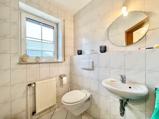 Schöne Doppelhaushälfte mit drei Schlafzimmern und pflegeleichtem Garten in zentraler und ruhiger Wohnlage von Fürstenau! Bild 24